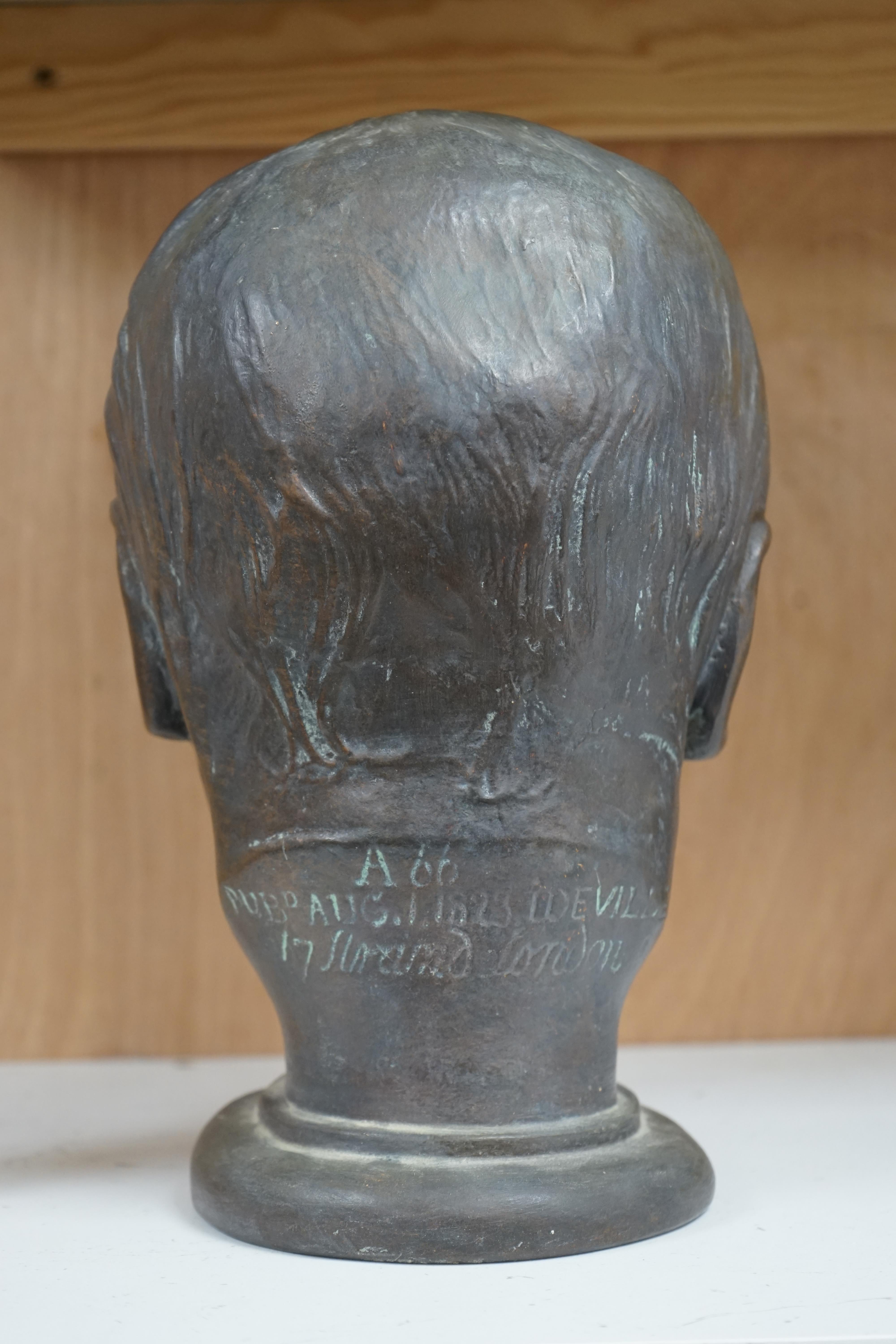 After James Deville, a bronzed plaster bust of William Blake, 28cm high. Condition - bronzed paint scratch to nose showing plaster